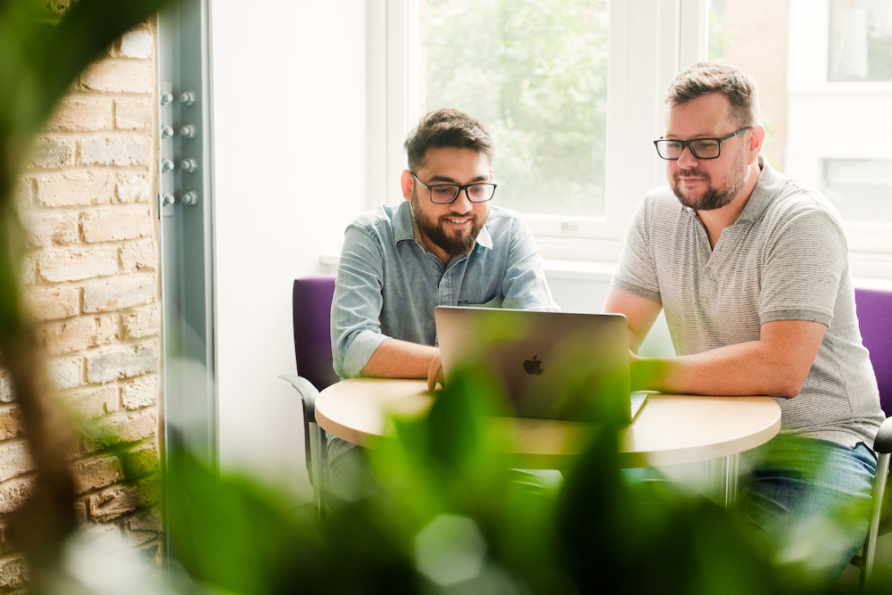 QA Experts Harsh and Paul at work