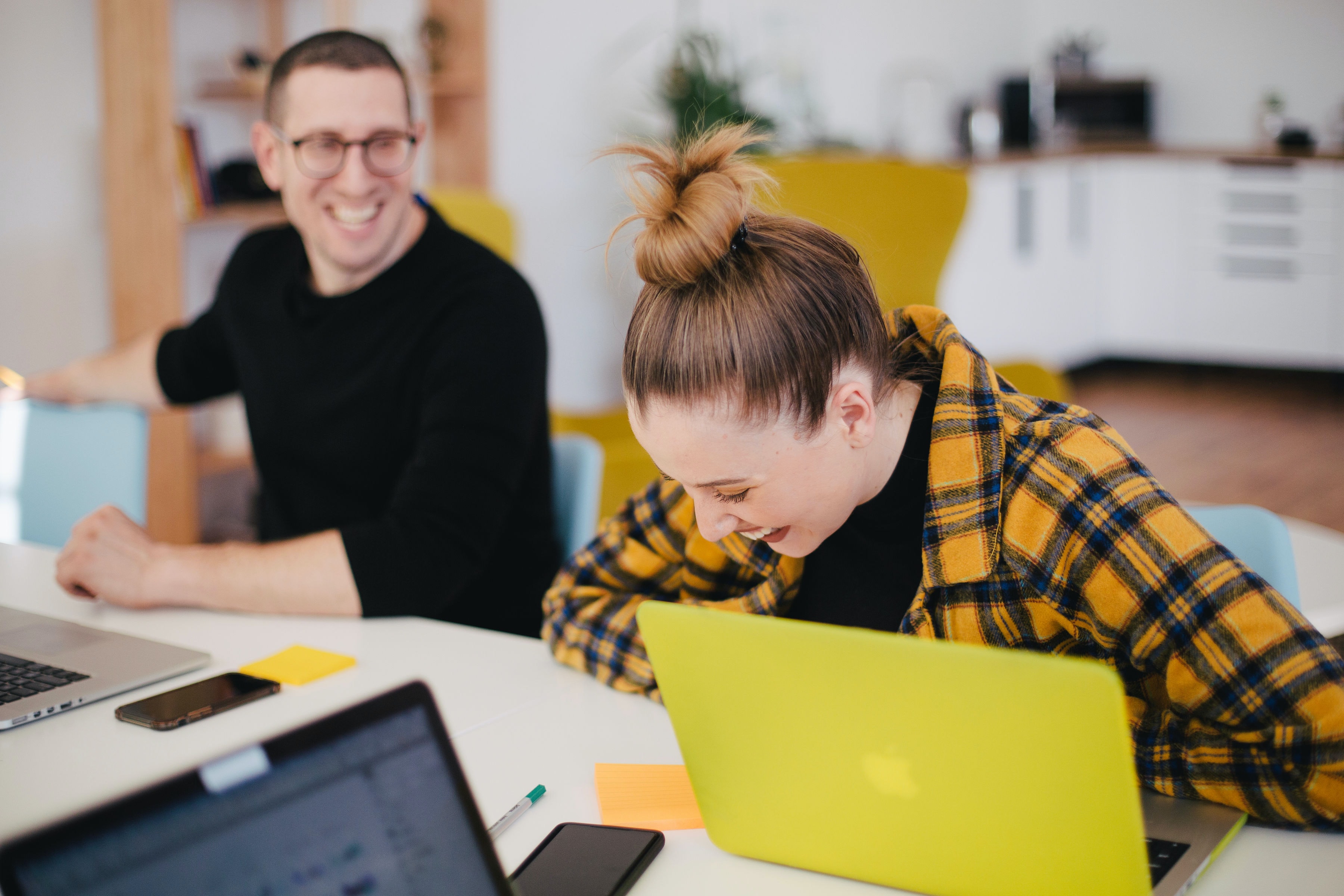 Woman in agency laughing