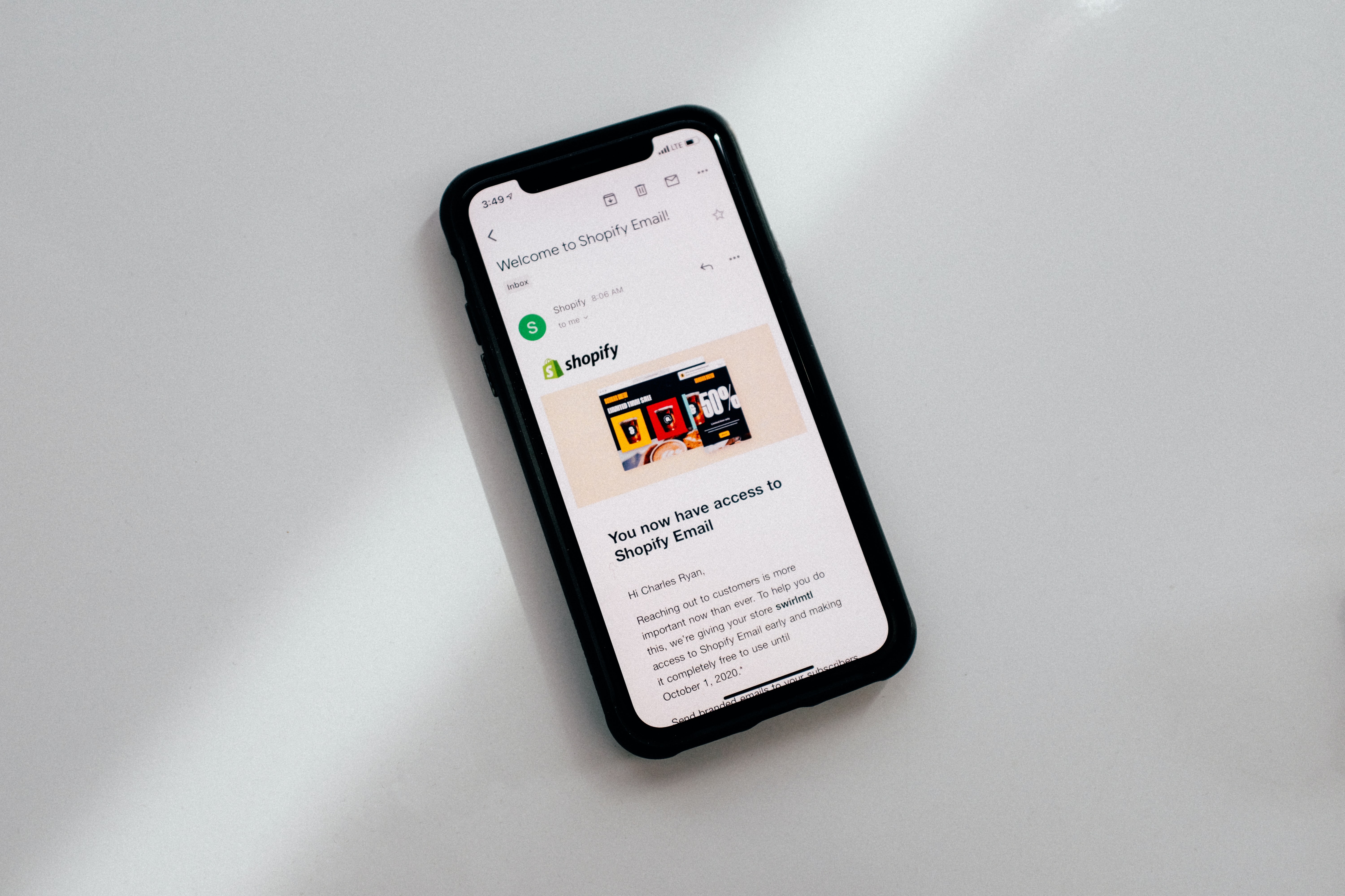 An iphone showing an email from Shopify
