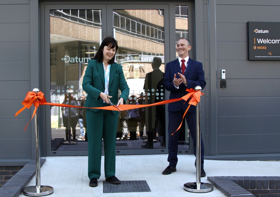 Councillor Emma Taylor, Labour Councillor for the Sharston Ward, cuts the ribbon outside MCR2 alongside Dominic Phillips (Datum CEO)