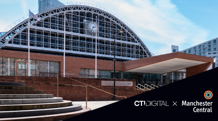 The outside of the Manchester Central building with a black triangle in the bottom right with the cti digital and manchester central logos in it