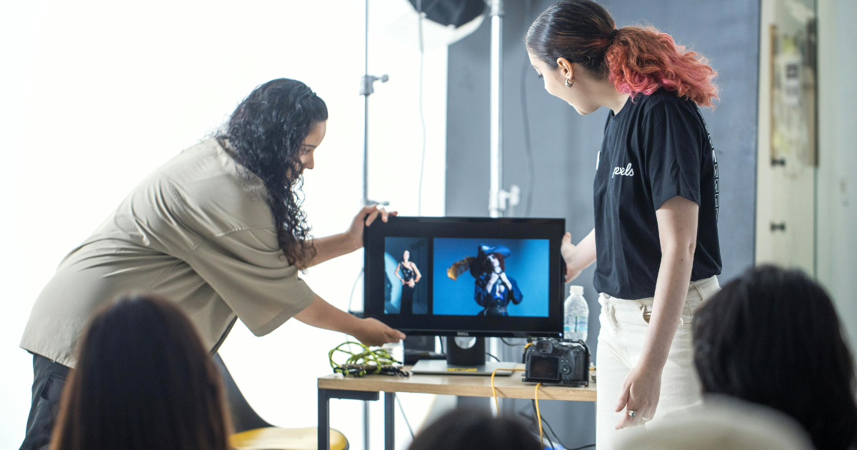 Creative team reviewing video footage in a professional studio environment