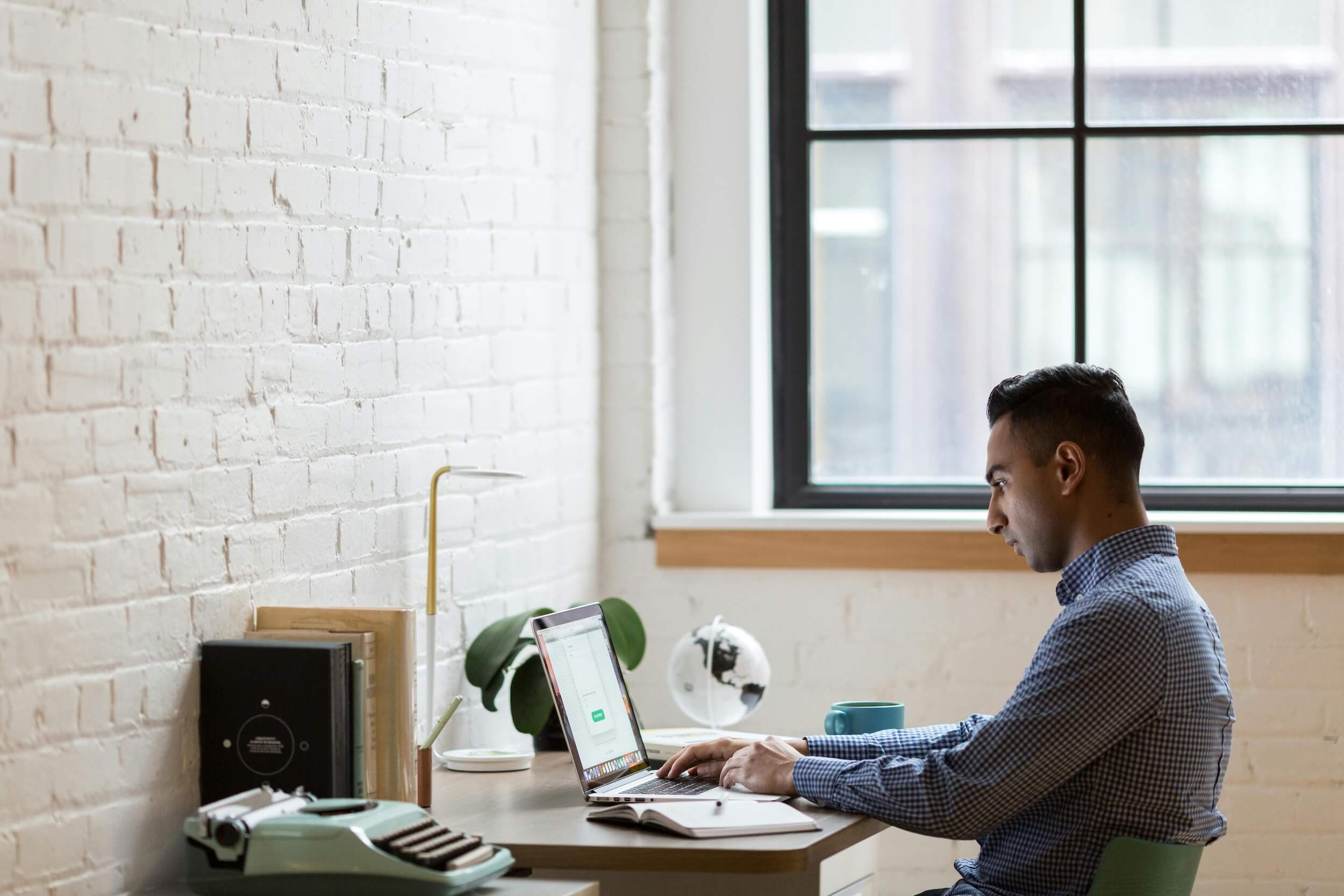 Male working on a laptop
