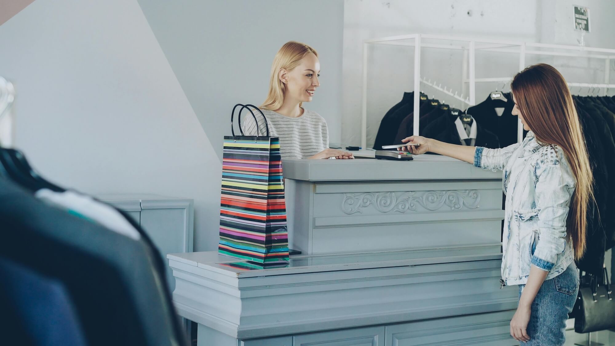 Woman making a purchase in store