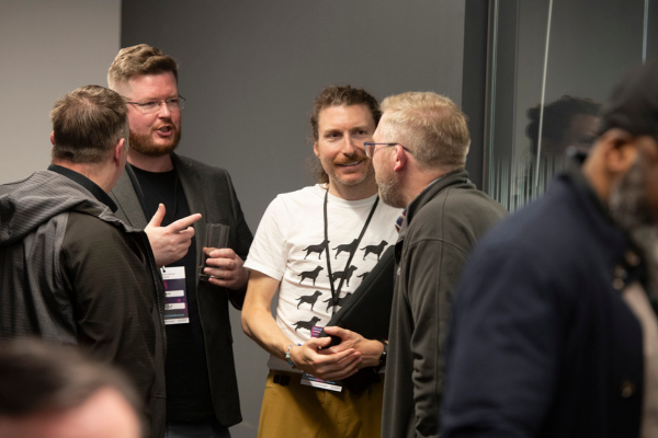 A group of men in conversation