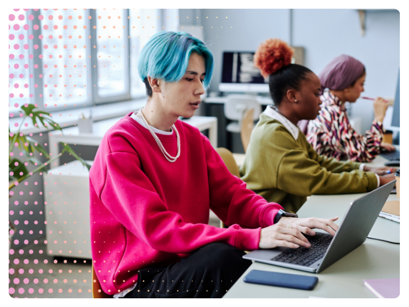 A young man works at a computer