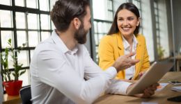 A male and female in conversation