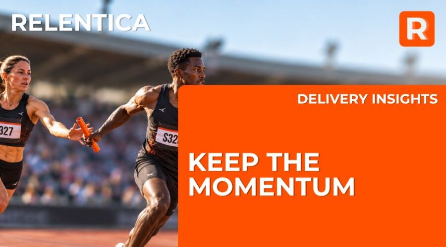 Relay runners handing over the baton to keep business momentum