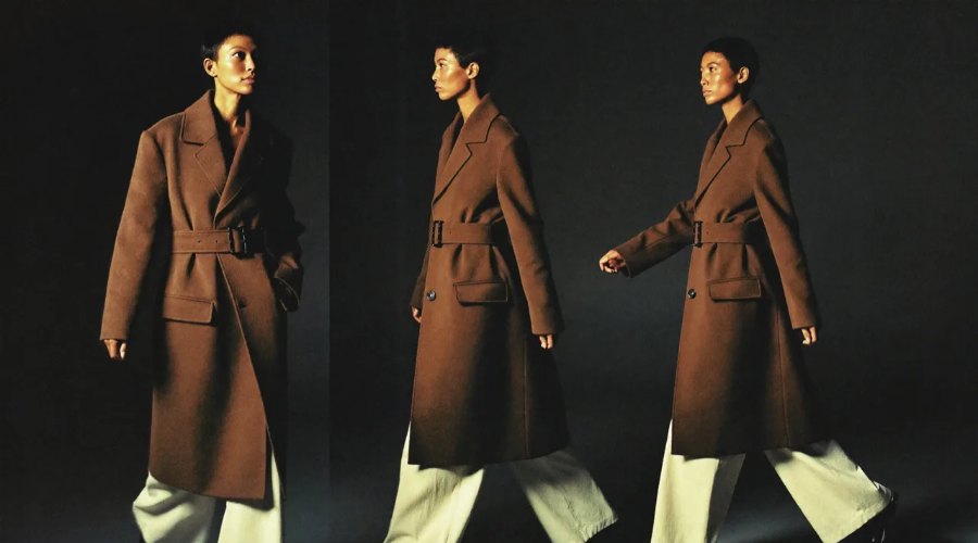 Three views of a model walking in a belted camel coat and cream trousers against a dark background, AI concept work